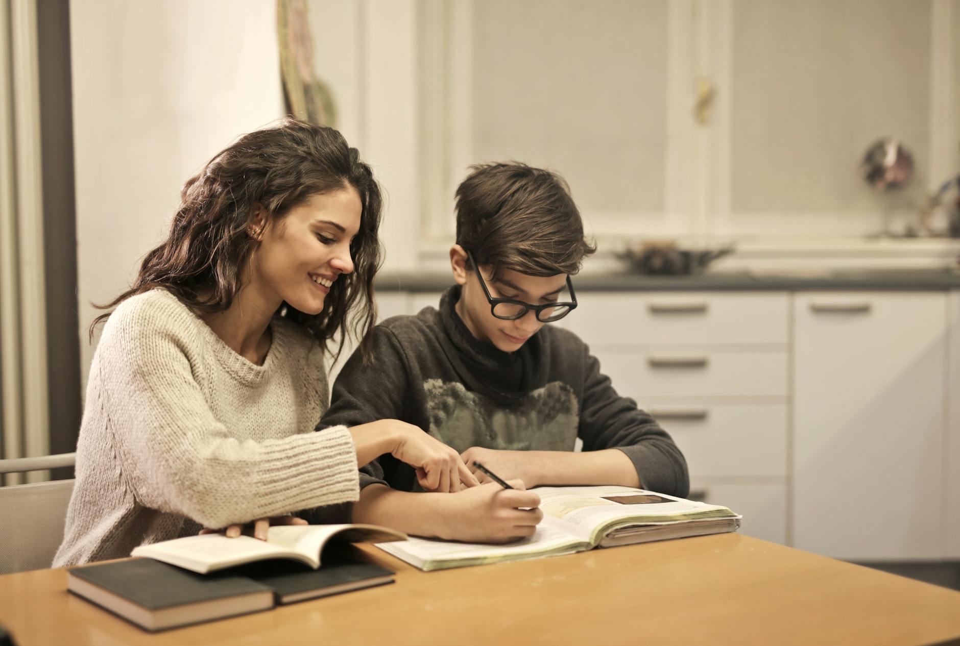elder sister and brother studying at home in Fill in the Blank Questions for Kids