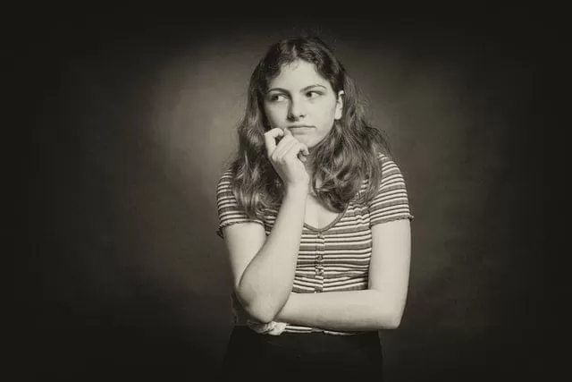 Girl under Tricky Yes or No Question Girl Thinking in Tricky Yes or No Question